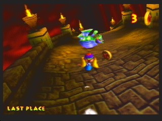 In one of the game's most dramatically challenging sequences, Tiny races a sliding beetle down a danger-filled tunnel.